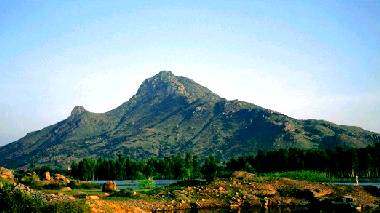 Arunachala mountain in southern India, site of the annual Kartikai Festival - Holy beacon of Shiva